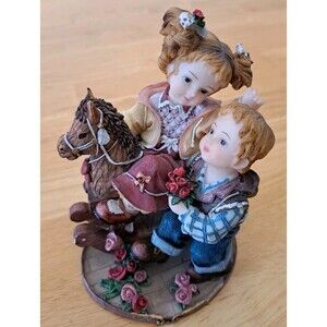 Montefiore Boy and Girl Resin Figurine with Rocking Horse Made in Italy
